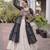 Garba outfits Black Laheriya Print Faux Georgette Kurti with Kora Cotton Lehenga Set