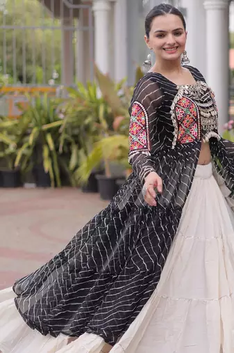 Garba outfits Black Laheriya Print Faux Georgette Kurti with Kora Cotton Lehenga Set