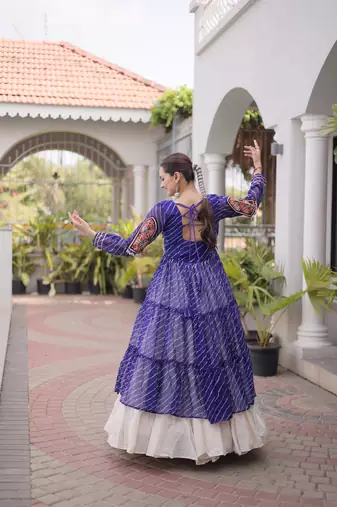 Garba outfits Blue Laheriya Print Faux Georgette Kurti with Kora Cotton Lehenga Set