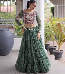 Garba outfits Green Bandhani Print Faux Georgette Kutchi Patchwork Lehenga Choli Set