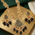 Gold-toned black beaded long necklace set with enamel thewa pendant and earrings