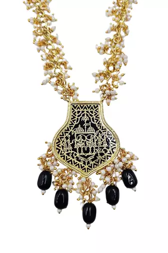 Gold-toned black beaded long necklace set with enamel thewa pendant and earrings