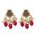 Gold-toned pearl beaded temple jewellery set with maroon stone pendant & earrings