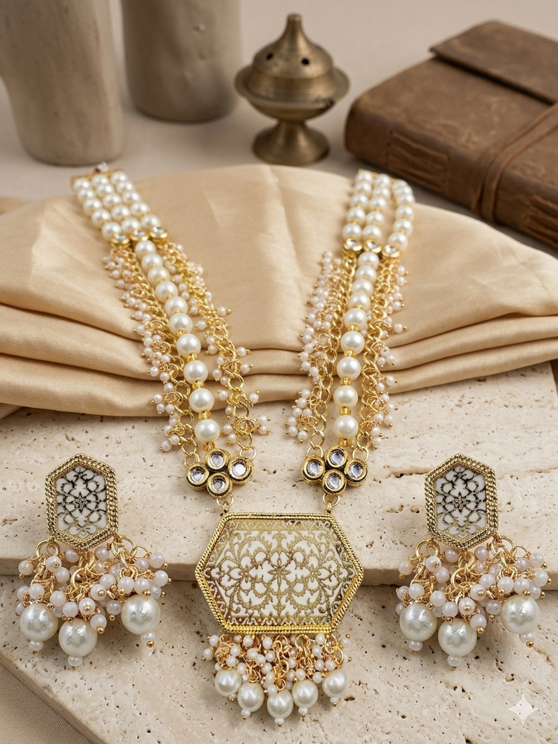 Antique gold-toned kundan pearl cluster necklace set with hexagonal meenakari pendant and pearl jhumka earrings