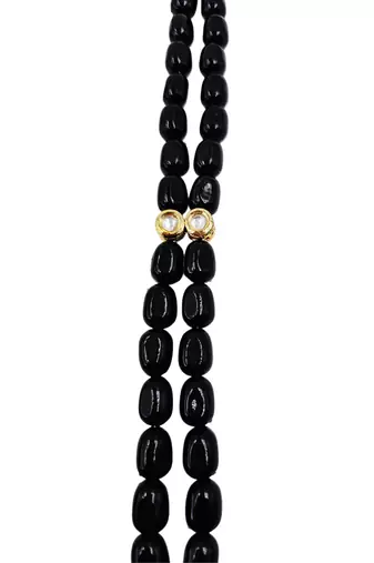 Gold-toned black kundan-studded peacock design long beaded necklace with earrings