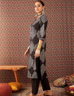 Women Ethnic Motifs Printed Regular Mirror Work Kurta with Trousers 6