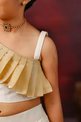 Cream kasavu skirt and one shoulder top