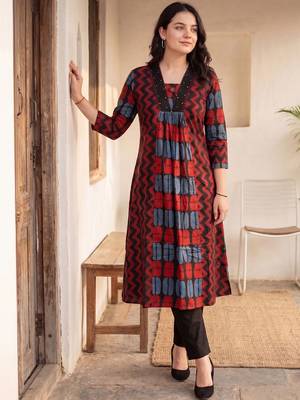Women Ethnic Motifs Printed Pleated Thread Work Cotton Kurta with Trousers 1