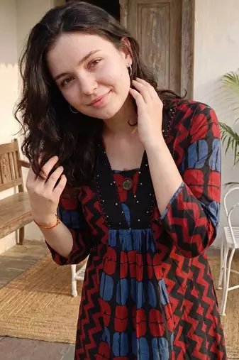 Women Ethnic Motifs Printed Pleated Thread Work Cotton Kurta with Trousers