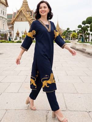 Women Ethnic Motifs Printed Regular Thread Work Kurta with Trousers 1