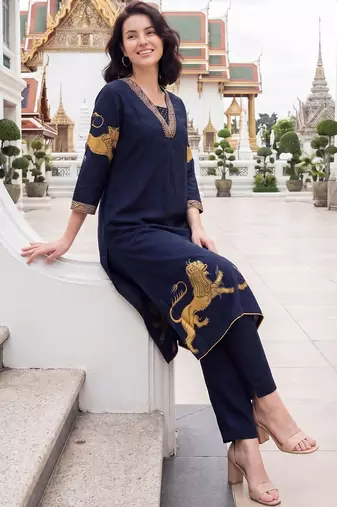 Women Ethnic Motifs Printed Regular Thread Work Kurta with Trousers
