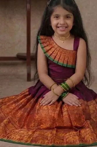 purple narayanipattu skirt and top