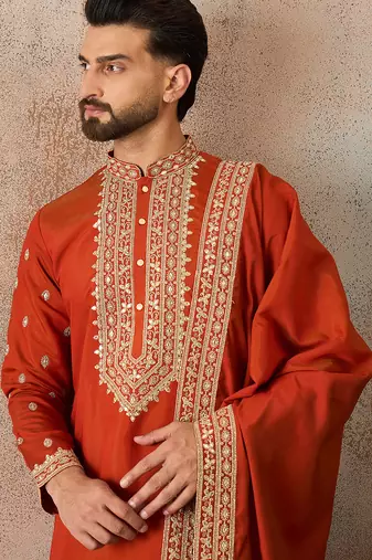 Mens orange silk blend solid embroidered kurta with dupatta