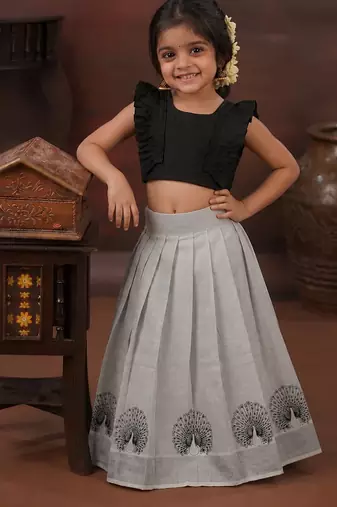 black tissue peacock skirt and top