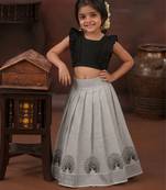 black tissue peacock skirt and top