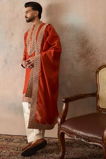 Mens orange silk blend solid embroidered kurta and trouser with dupatta