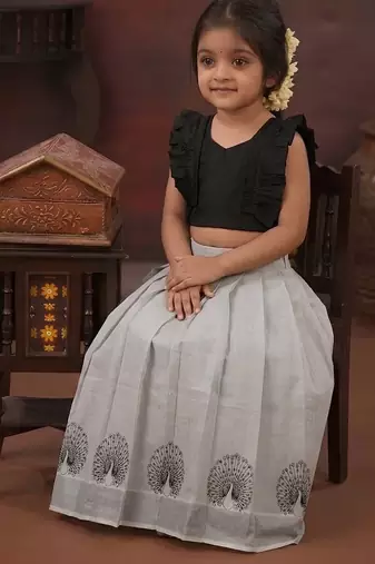 black tissue peacock skirt and top