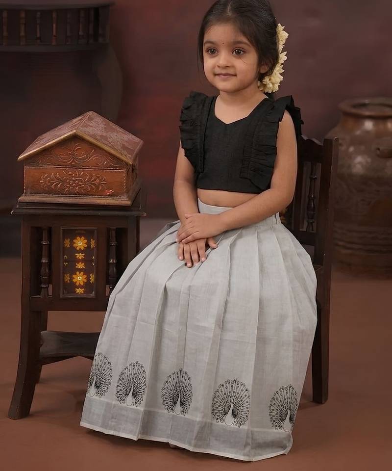 black tissue peacock skirt and top