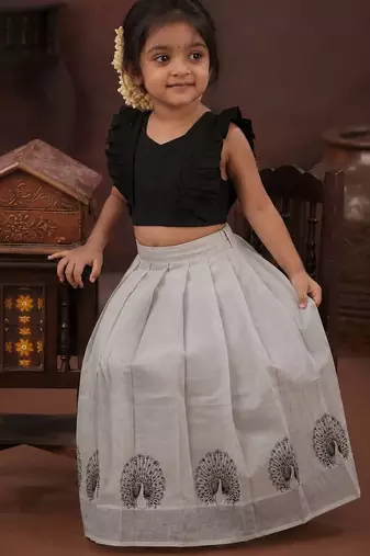 black tissue peacock skirt and top