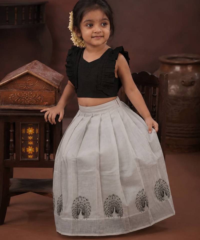black tissue peacock skirt and top