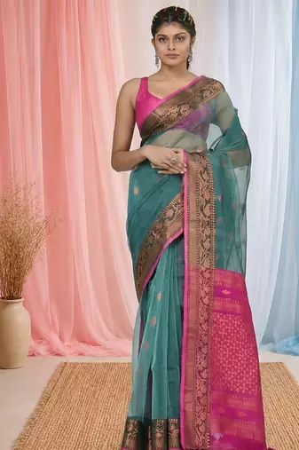 elegant teal and fuchsia resham saree with zari border