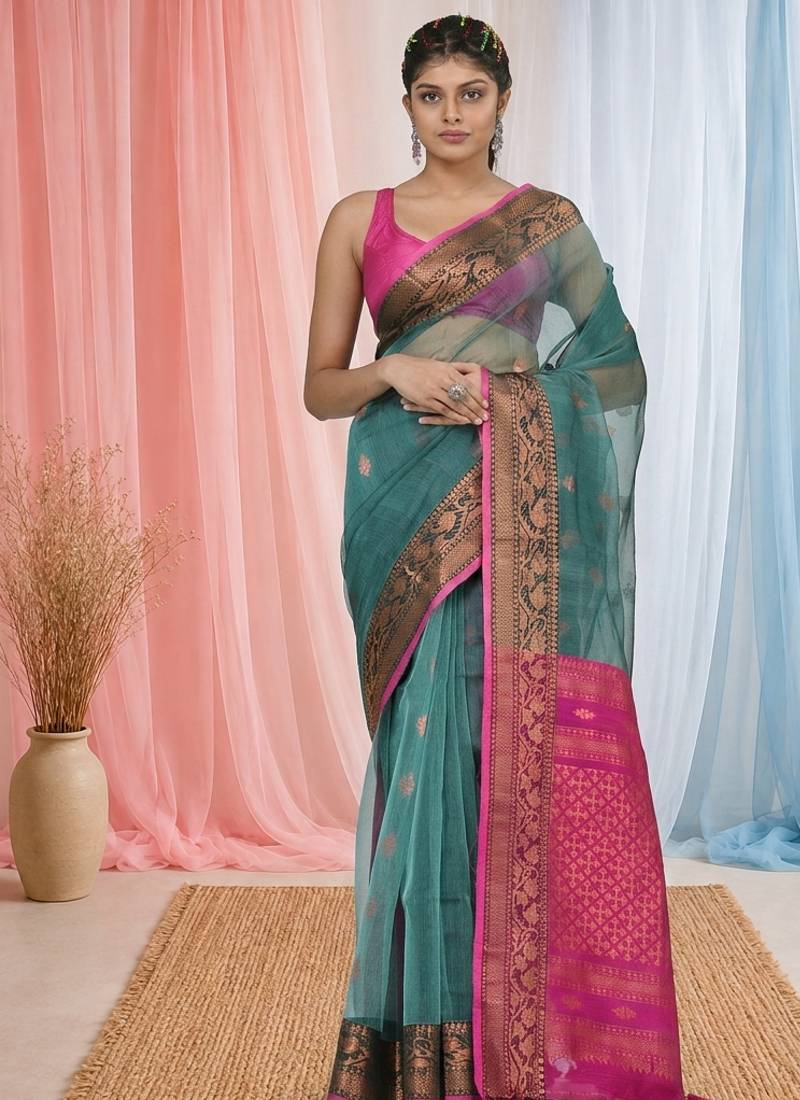 elegant teal and fuchsia resham saree with zari border