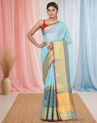 Elegant sky blue and gold linen saree with striped borders 5