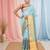 Elegant sky blue and gold linen saree with striped borders