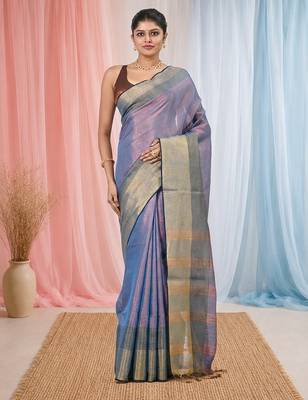 Elegant blue tissue saree with contrasting golden border 5