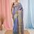Elegant blue tissue saree with contrasting golden border
