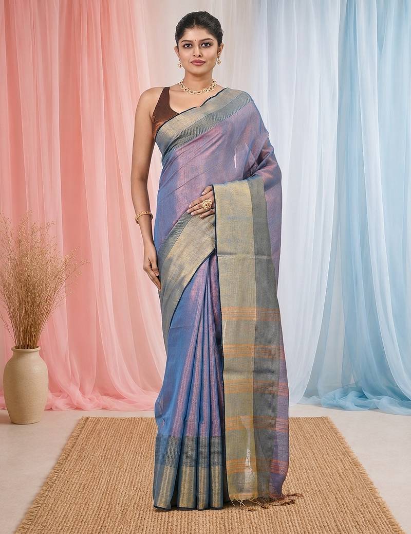 Elegant blue tissue saree with contrasting golden border