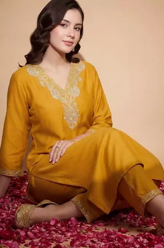 Women Ethnic Motifs Embroidered Regular Sequinned Kurta with Trousers