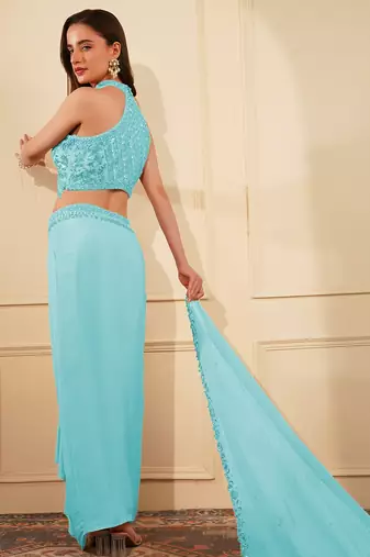 Light blue crepe drape skirt set with heavy hand embroidered blouse and dupatta