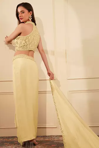Cream  colour crepe drape skirt set with heavy hand embroidered blouse and dupatta