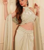 Dull ivory crepe drape skirt set with heavy hand embroidered blouse and dupatta