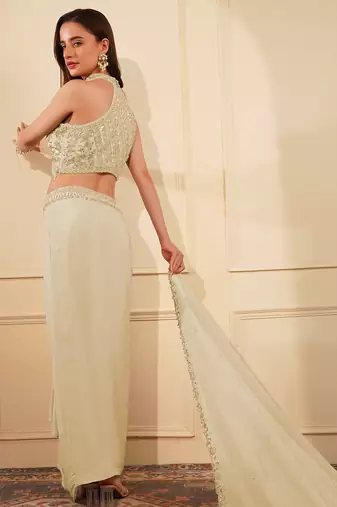 Dull ivory crepe drape skirt set with heavy hand embroidered blouse and dupatta