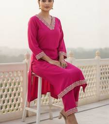 Women Ethnic Motifs Embroidered Regular Sequinned Kurta with Trousers