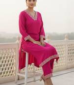 Women Ethnic Motifs Embroidered Regular Sequinned Kurta with Trousers
