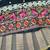 Black faux georgette lehenga choli set with real mirror work