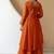 Women's orange embroidered anarkali kurta set with palazzo & dupatta