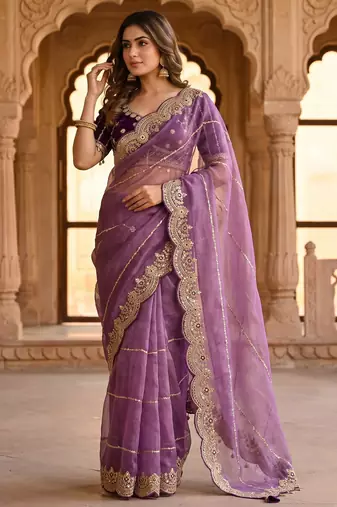 lavender color embroidery sequence work heavy border with buttis satin saree