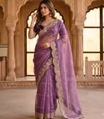 lavender color embroidery sequence work heavy border with buttis satin saree