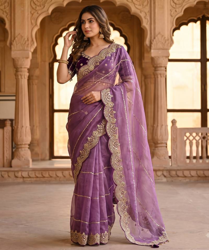 lavender color embroidery sequence work heavy border with buttis satin saree