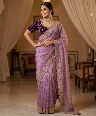 lavender color embroidery sequence work heavy border with buttis satin saree 4