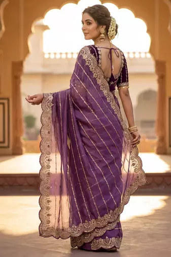 lavender color embroidery sequence work heavy border with buttis satin saree