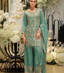 Women Ethnic Motifs Embroidered Regular Sequinned Kurta with Sharara & With Dupatta