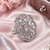 Rhodium finish pink cz stone adjustable ring