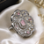 Rhodium finish pink cz stone adjustable ring