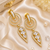 Gold finish white halo drop earrings