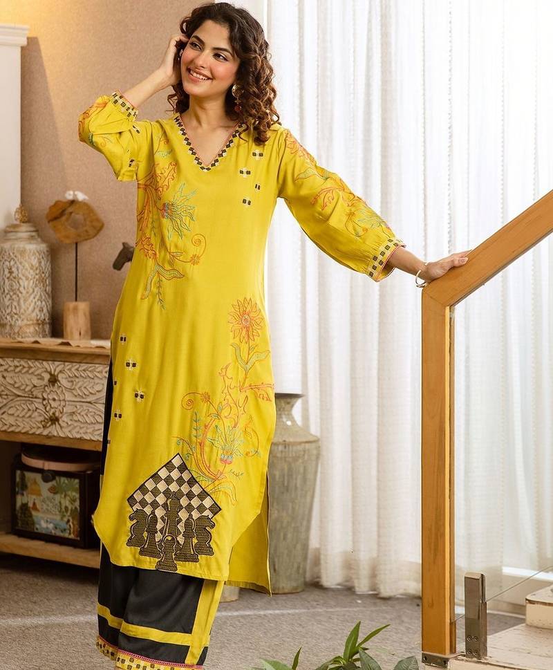 Women Ethnic Motifs Printed Regular Thread Work Kurta with Palazzos